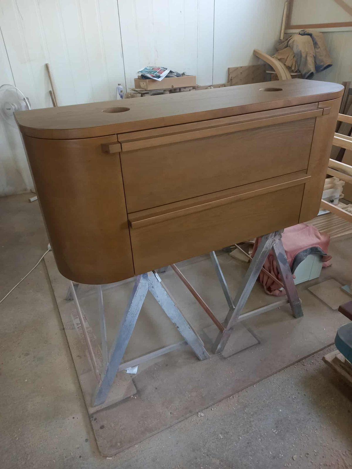 Curved oak cabinet with drawers