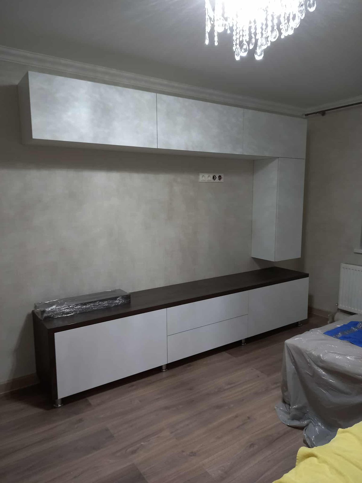 Fitted wall units and a long media cabinet