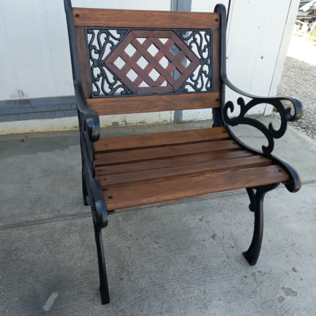 Slatted timber chair with cast iron frame