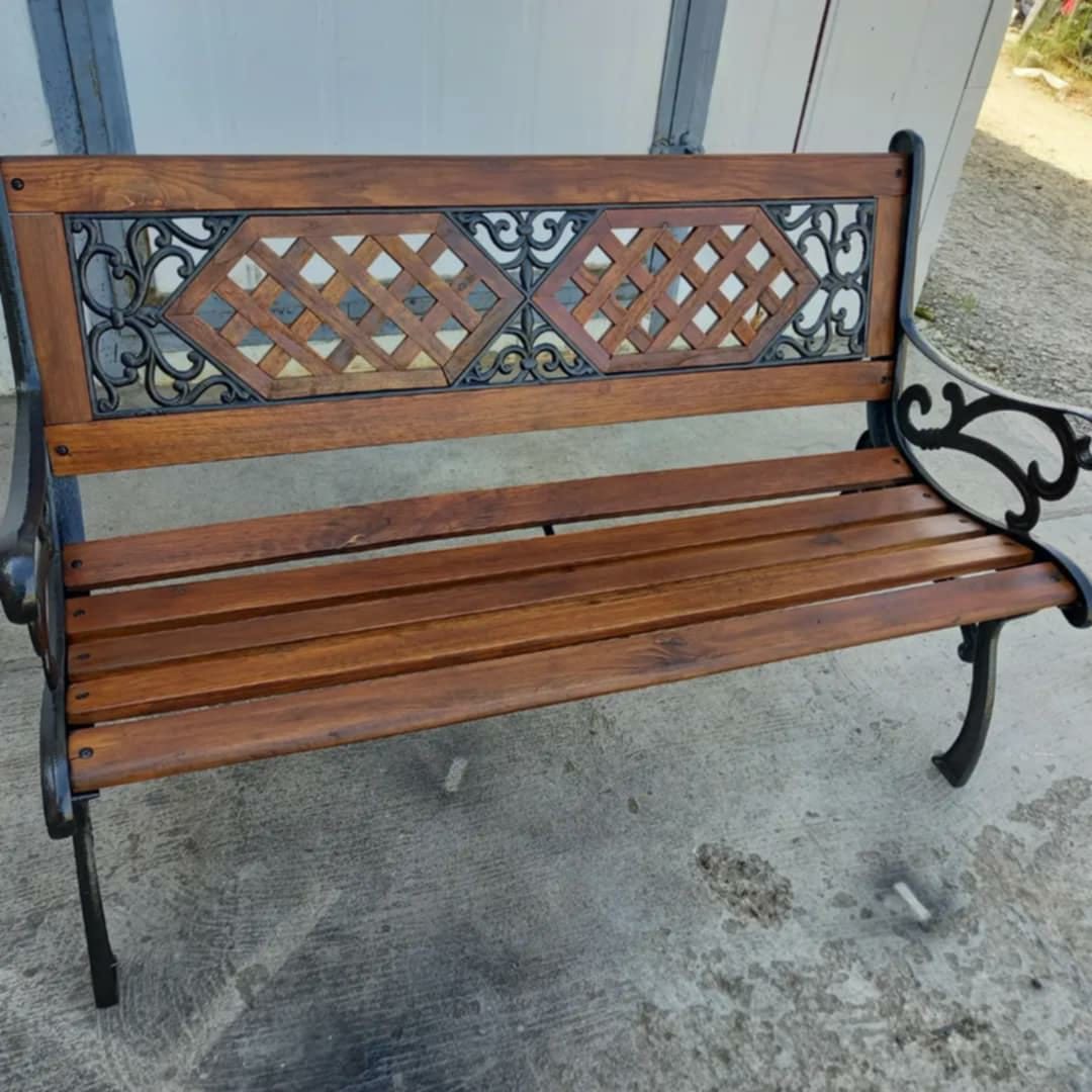 Garden bench with lattice back and cast iron frame