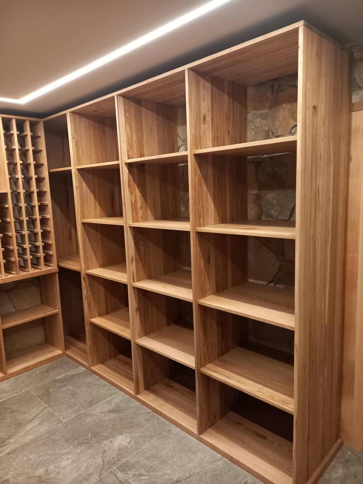 Oak wine room shelving with LED lighting