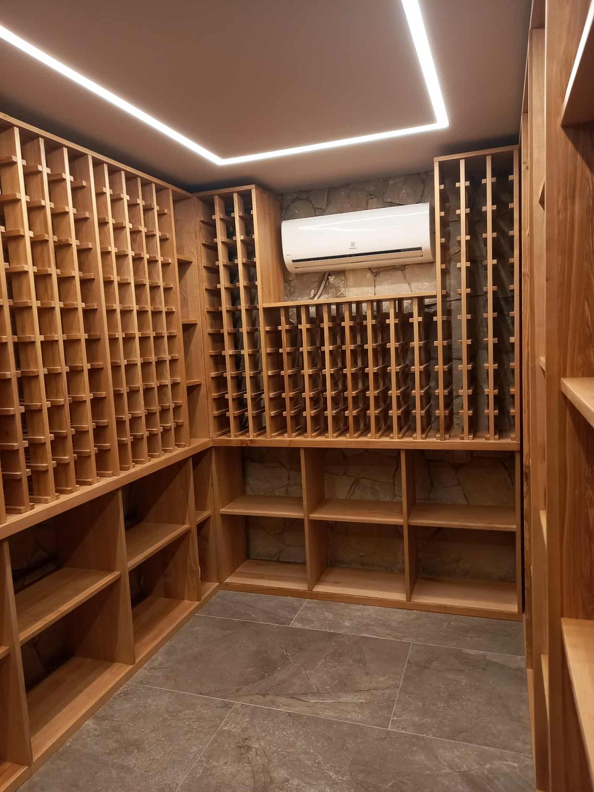Oak wine room with bottle racks
