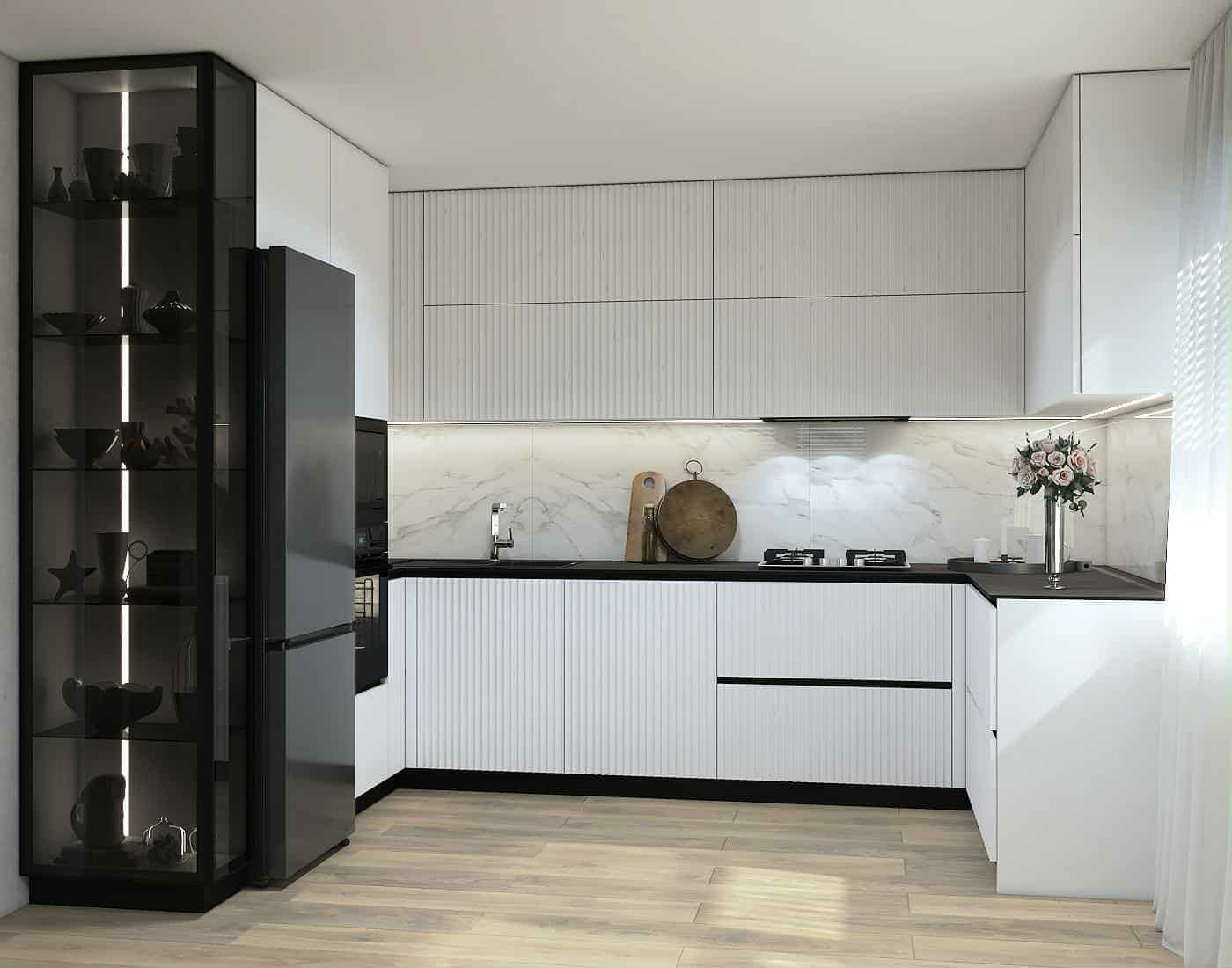 White and black fitted kitchen with a glass display unit